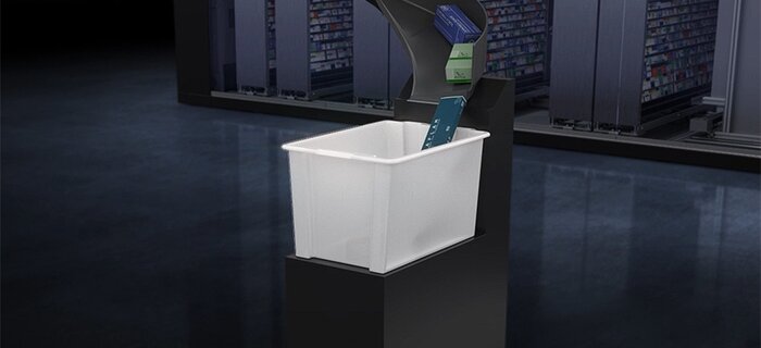 Cubeta en punto de entrega del robot dispensador